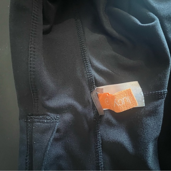 Woman's Lucy Activewear, black, flare pants. Size small. Elastic waist /pocket. - Picture 6 of 7